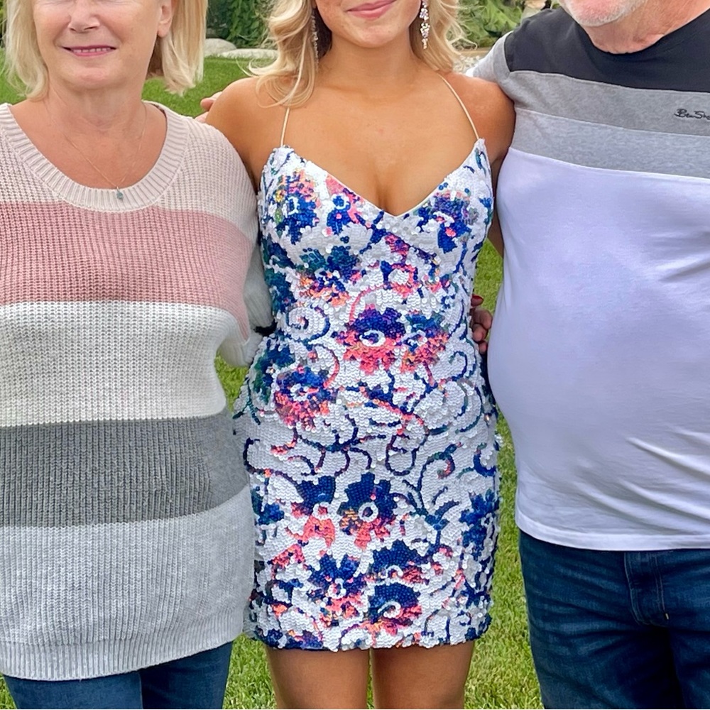 This is a Jovani size 2 sequin dress. Colors are mainly pink/blue iridescent